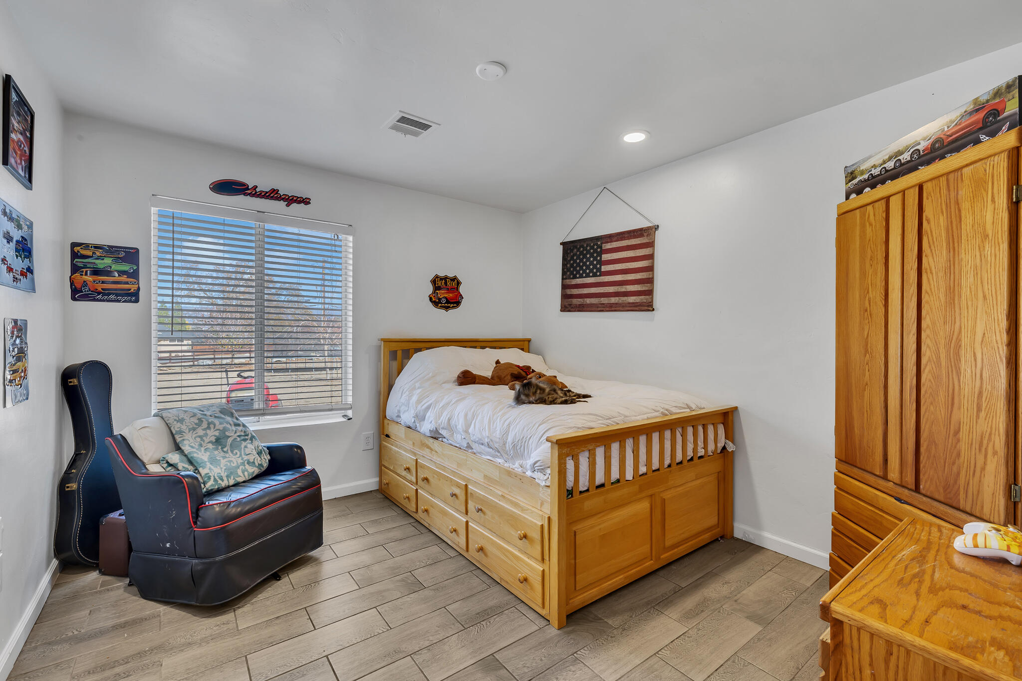 17681 Busher Way Tehachapi, CA 93561 - Photo 17 of 54 a bedroom with a bed and a window