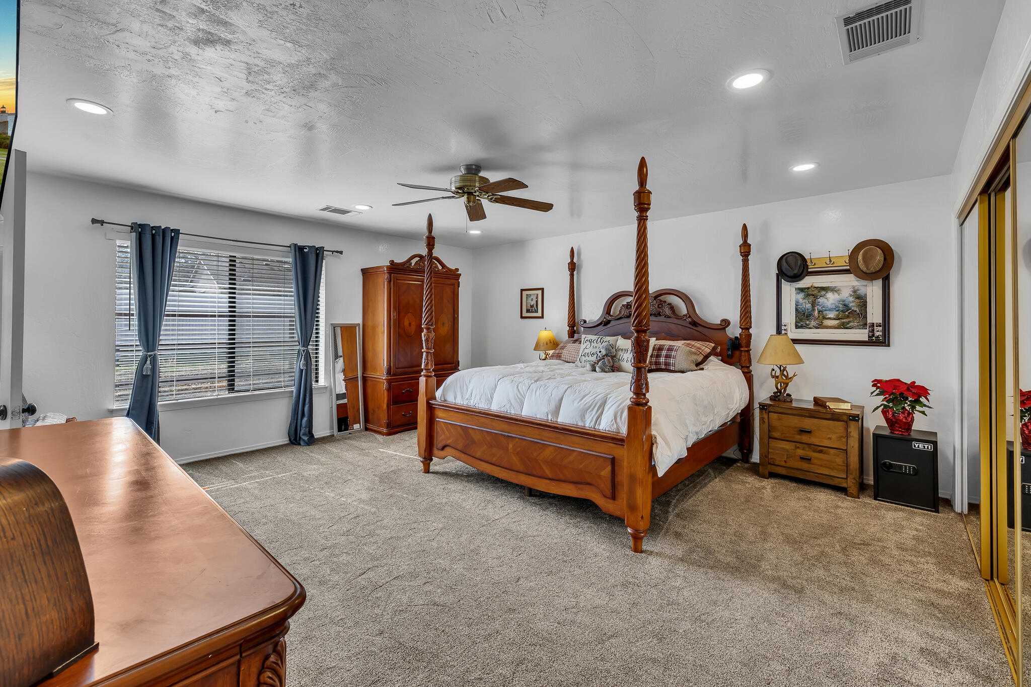 17681 Busher Way Tehachapi, CA 93561 - Photo 46 of 54 a bedroom with a bed and dresser