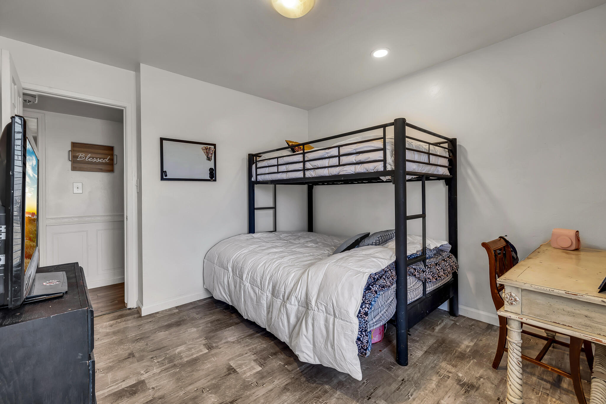 17681 Busher Way Tehachapi, CA 93561 - Photo 50 of 54 a bedroom with a bed a couch and dresser