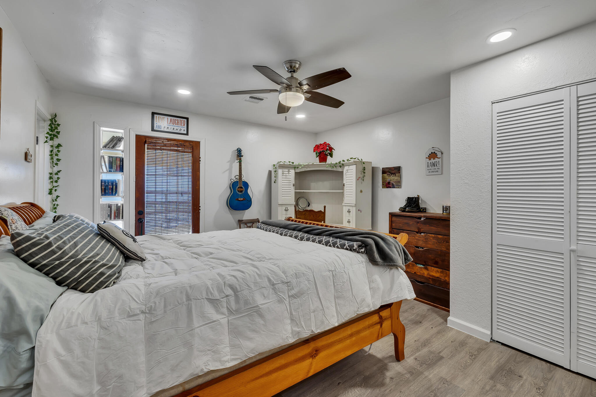 17681 Busher Way Tehachapi, CA 93561 - Photo 53 of 54 a bedroom with bed and wooden floor