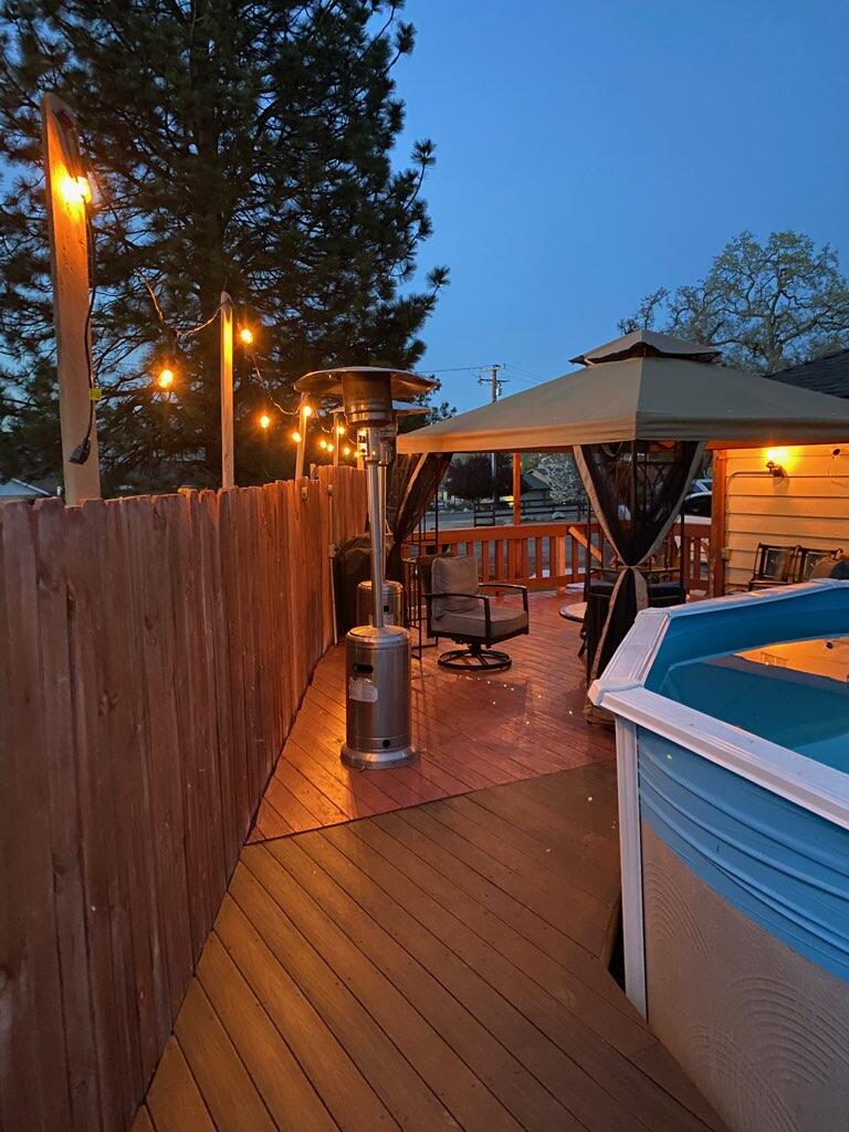 17681 Busher Way Tehachapi, CA 93561 - Photo 7 of 54 a view of outdoor space with wooden floor and barbeque oven