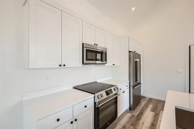 a bathroom with a toilet and bathtub