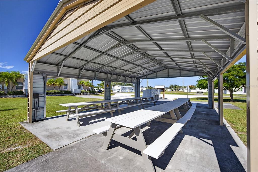 29221 Orangewood Street Punta Gorda, FL 33982 - Photo 35 of 38 a view of a swimming pool with a patio