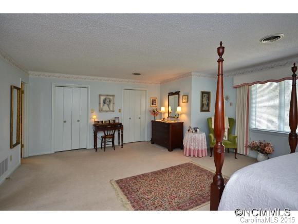 503 Crowfields Lane Asheville, NC 28803 - Photo 11 of 20 a living room with furniture and a dining table