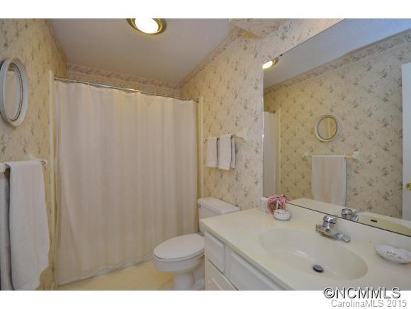 503 Crowfields Lane Asheville, NC 28803 - Photo 16 of 20 a bathroom with a sink toilet and shower