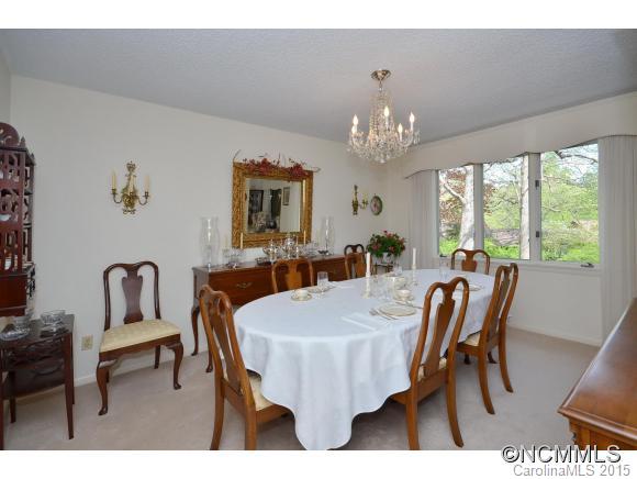 503 Crowfields Lane Asheville, NC 28803 - Photo 5 of 20 a view of a dining room with furniture window and wooden floor