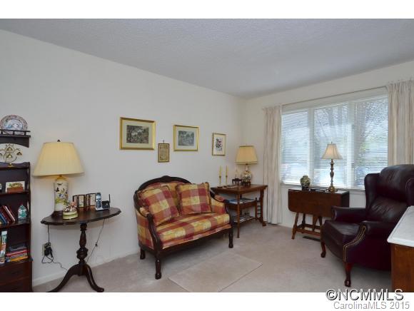 503 Crowfields Lane Asheville, NC 28803 - Photo 9 of 20 a living room with furniture and a window
