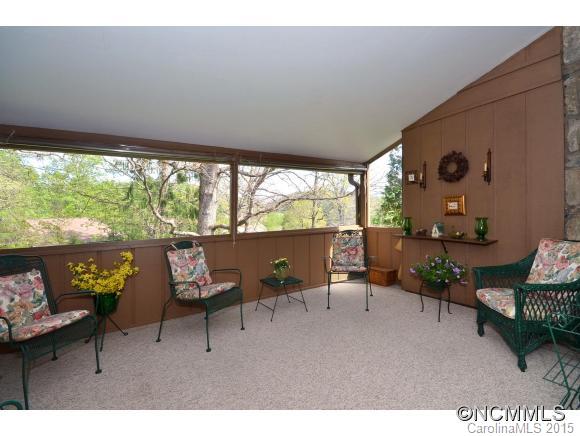 503 Crowfields Lane Asheville, NC 28803 - Photo 10 of 20 a living room with furniture and a large window
