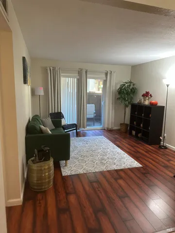 a kitchen with stainless steel appliances a stove a sink and a refrigerator