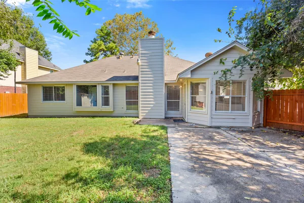 a house view with a garden space