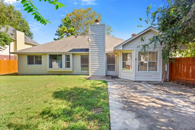 a house view with a garden space