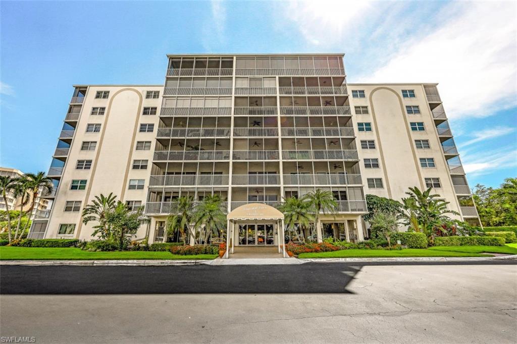 1 Bluebill Avenue, Unit 803 Naples, FL 34108 - Photo 4 of 19 front view of a building