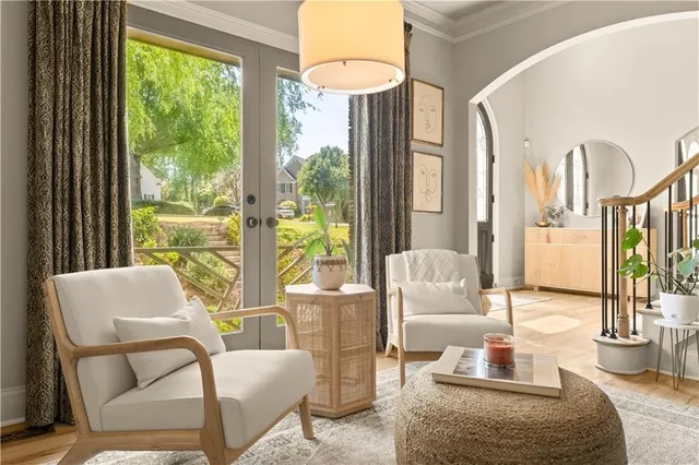 a living room with furniture and a window