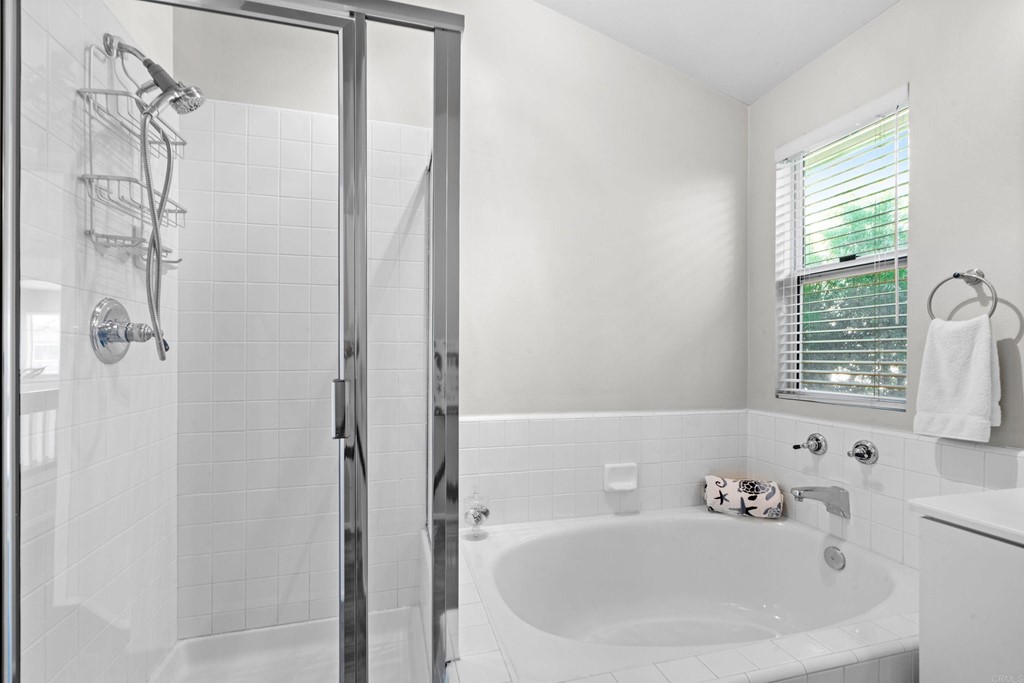 7 Monaco Dana Point, CA 92629 - Photo 19 of 32 a bathroom with a sink and a bathtub