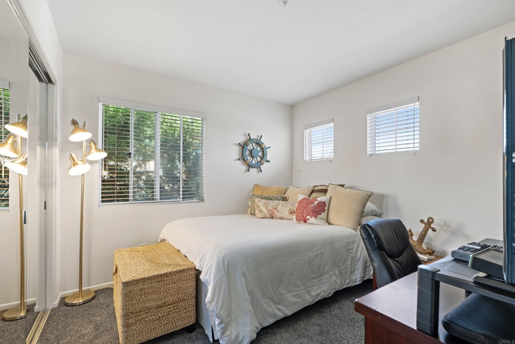 7 Monaco Dana Point, CA 92629 - Photo 20 of 32 a bedroom with two beds and a window