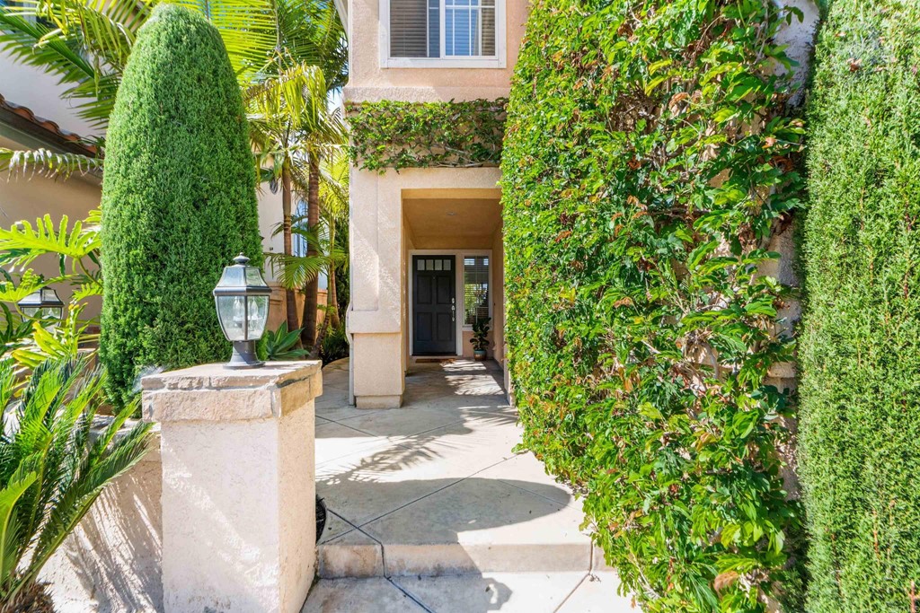 7 Monaco Dana Point, CA 92629 - Photo 3 of 32 a view of a house with potted plants