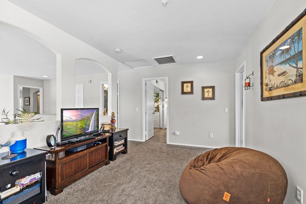 7 Monaco Dana Point, CA 92629 - Photo 23 of 32 a living room with furniture and a flat screen tv