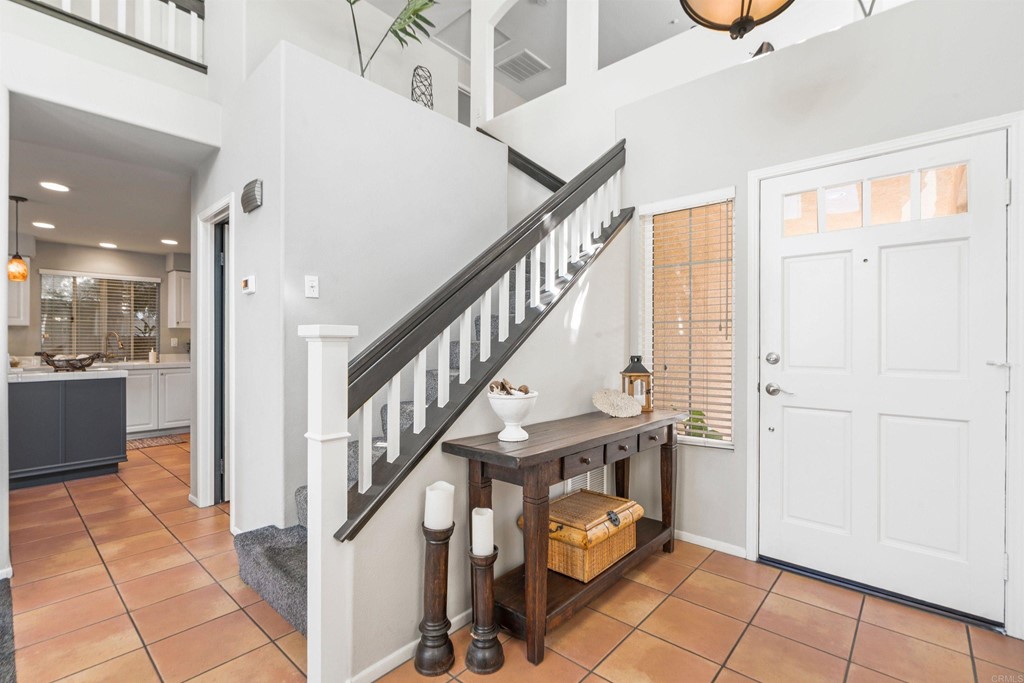 7 Monaco Dana Point, CA 92629 - Photo 4 of 32 a view of entryway with dining room and stairs
