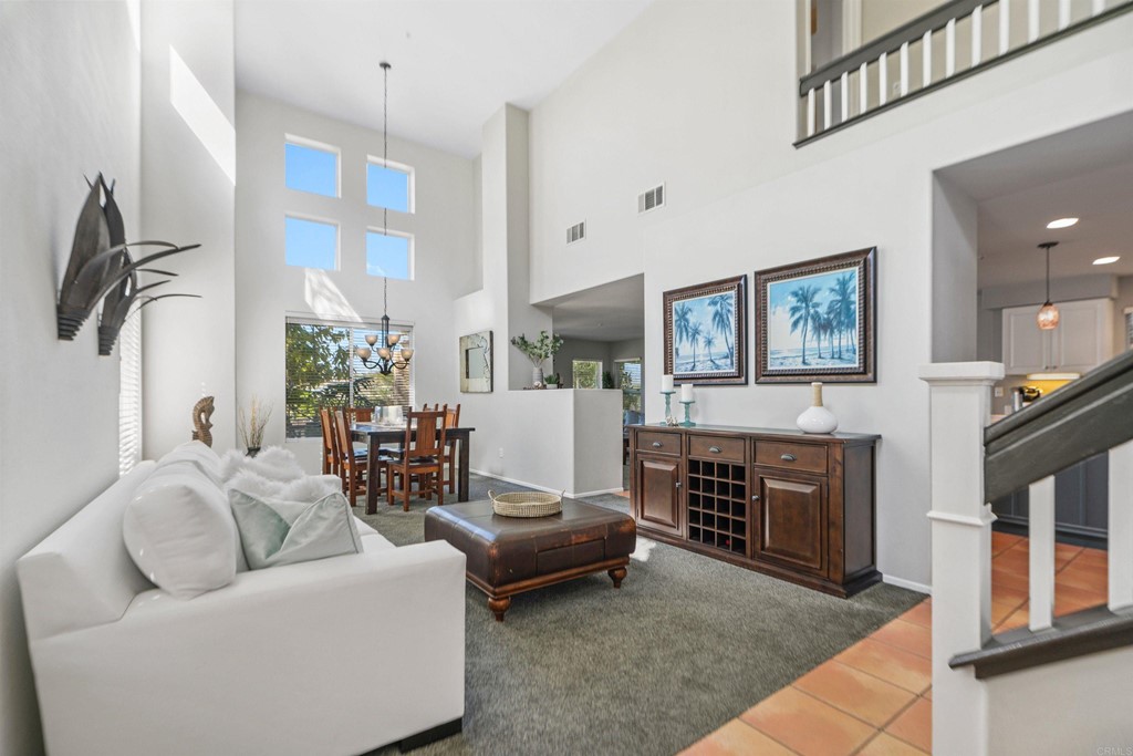 7 Monaco Dana Point, CA 92629 - Photo 5 of 32 a living room with furniture and a fireplace