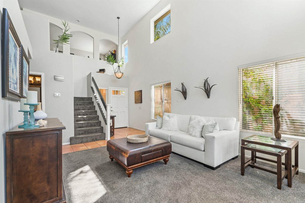 7 Monaco Dana Point, CA 92629 - Photo 7 of 32 a living room with furniture and a fireplace