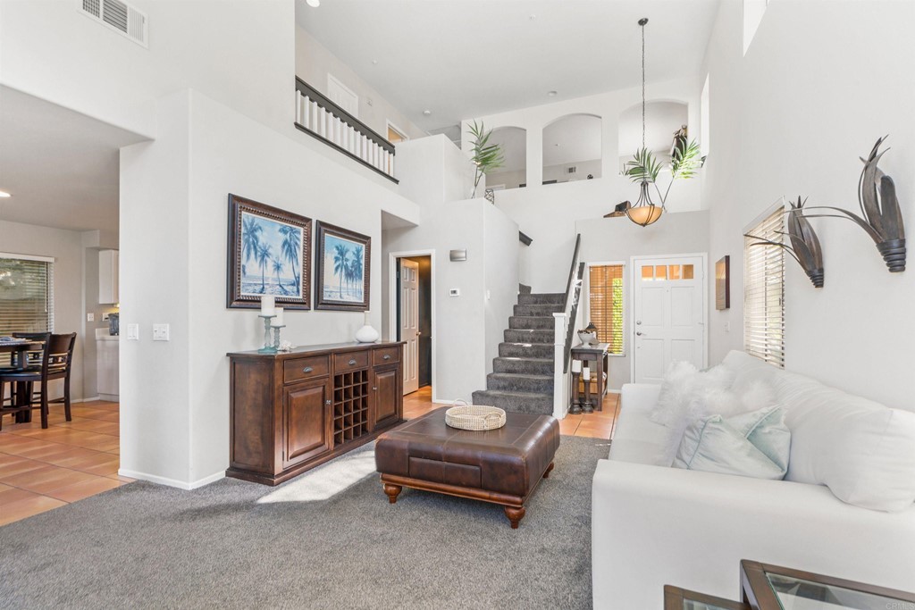 7 Monaco Dana Point, CA 92629 - Photo 8 of 32 a living room with furniture and a fireplace