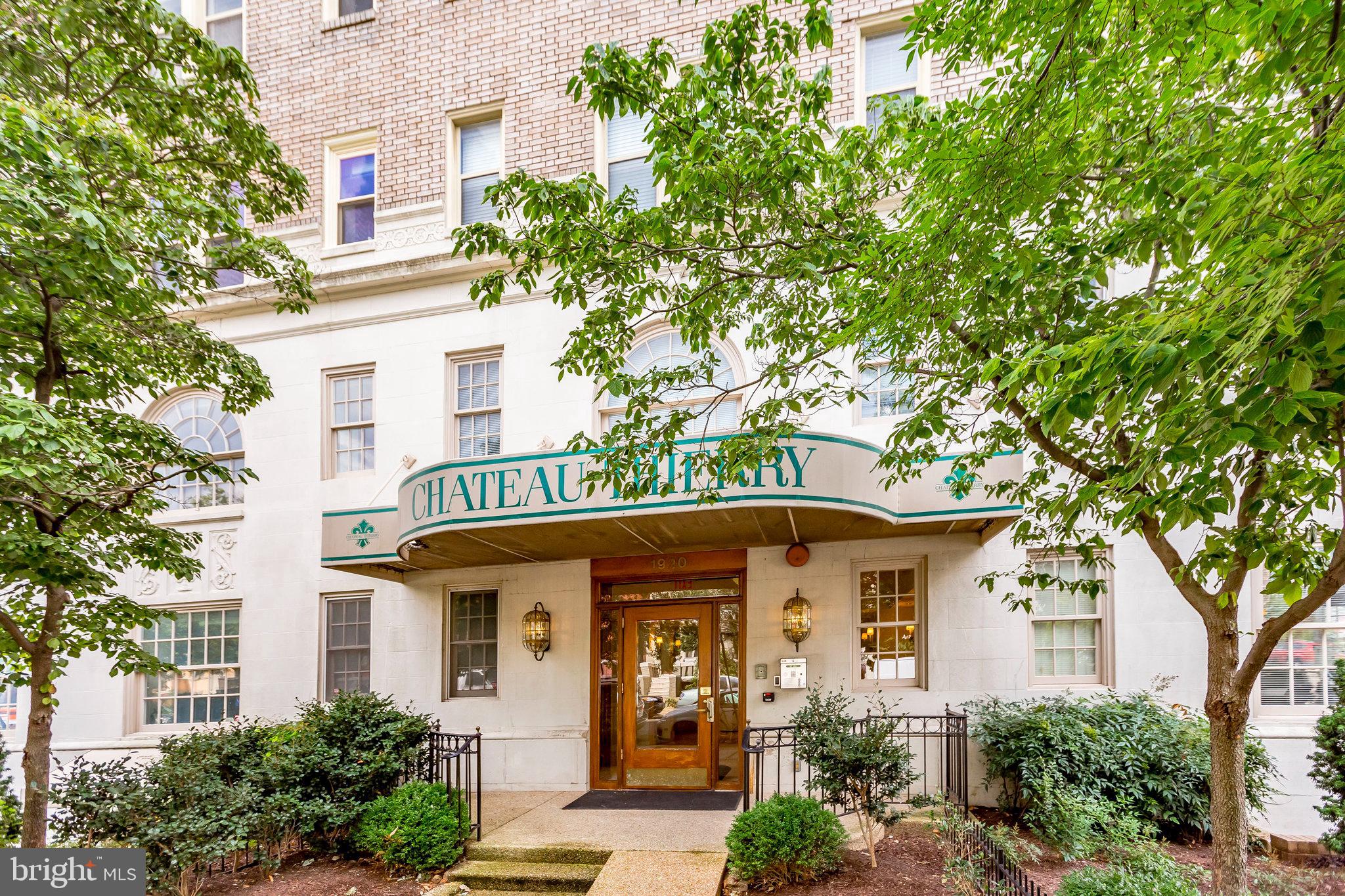 1920 S Street Northwest, Unit 804 Washington, DC 20009 - Photo 2 of 25 front view of a house with a tree