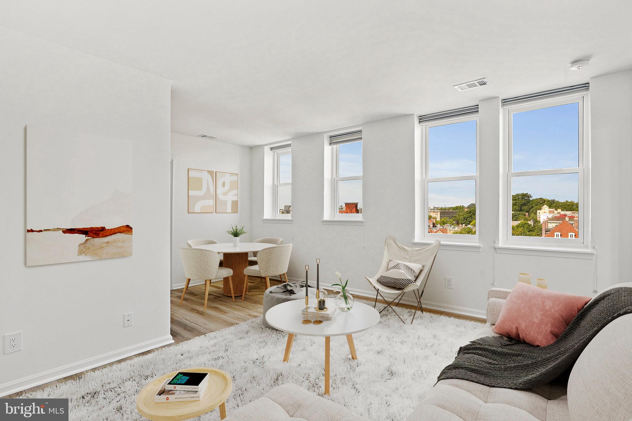 1920 S Street Northwest, Unit 804 Washington, DC 20009 - Photo 5 of 25 a living room with furniture and window