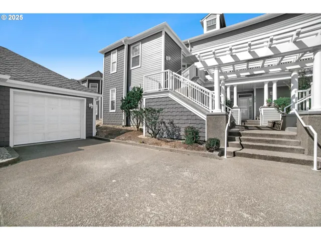 a view of a house with a street