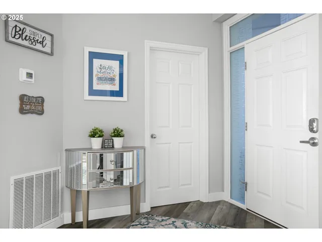 a view of livingroom with furniture and cabinet