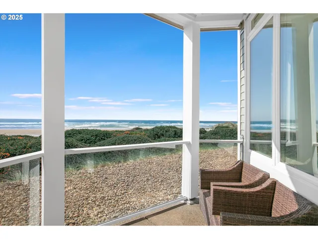 a view of a floor to ceiling window and an outdoor view