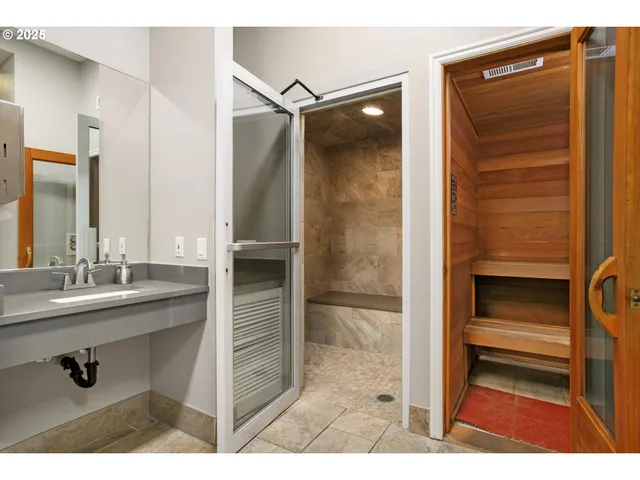 a bathroom with a sink and mirror