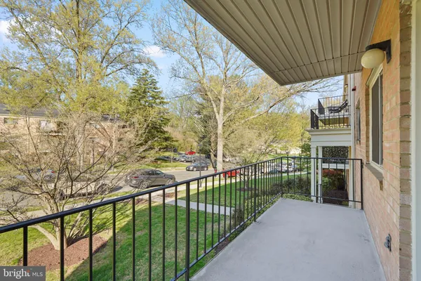 a view of balcony with furniture