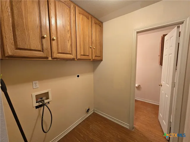 a bathroom with a granite countertop window and a shower