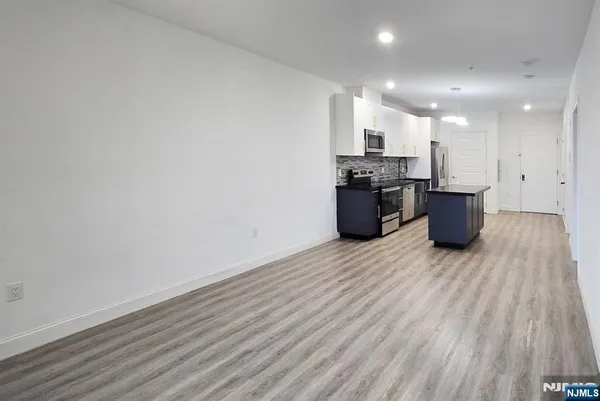 a bathroom with a sink a toilet and bathtub