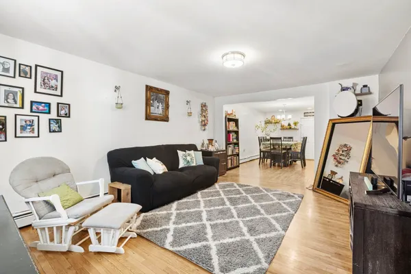 a bedroom with a bed and a ceiling fan