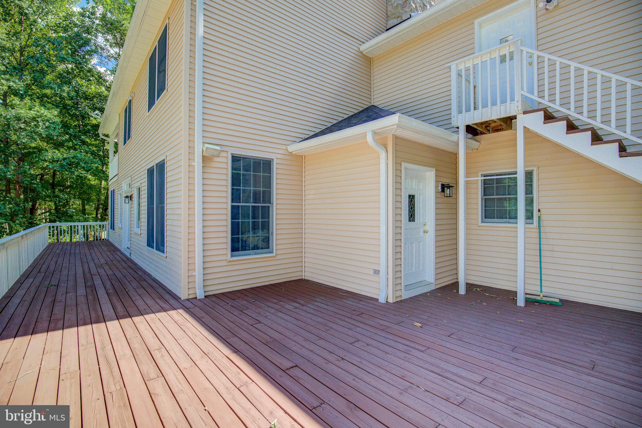 813 Blacks Hill Road Great Falls, VA 22066 - Photo 73 of 92 Rear Deck with Side Entrance to Mud Room