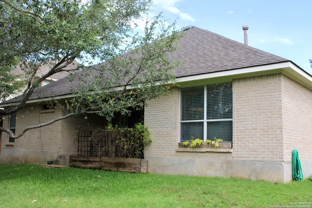 a backyard of a house with lots of green space