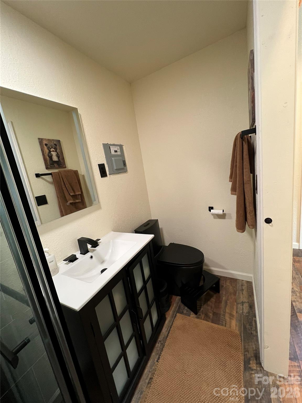 415 Hyde Road, Unit 24 Robbinsville, NC 28771 - Photo 11 of 47 a view of a hallway with furniture and wooden floor