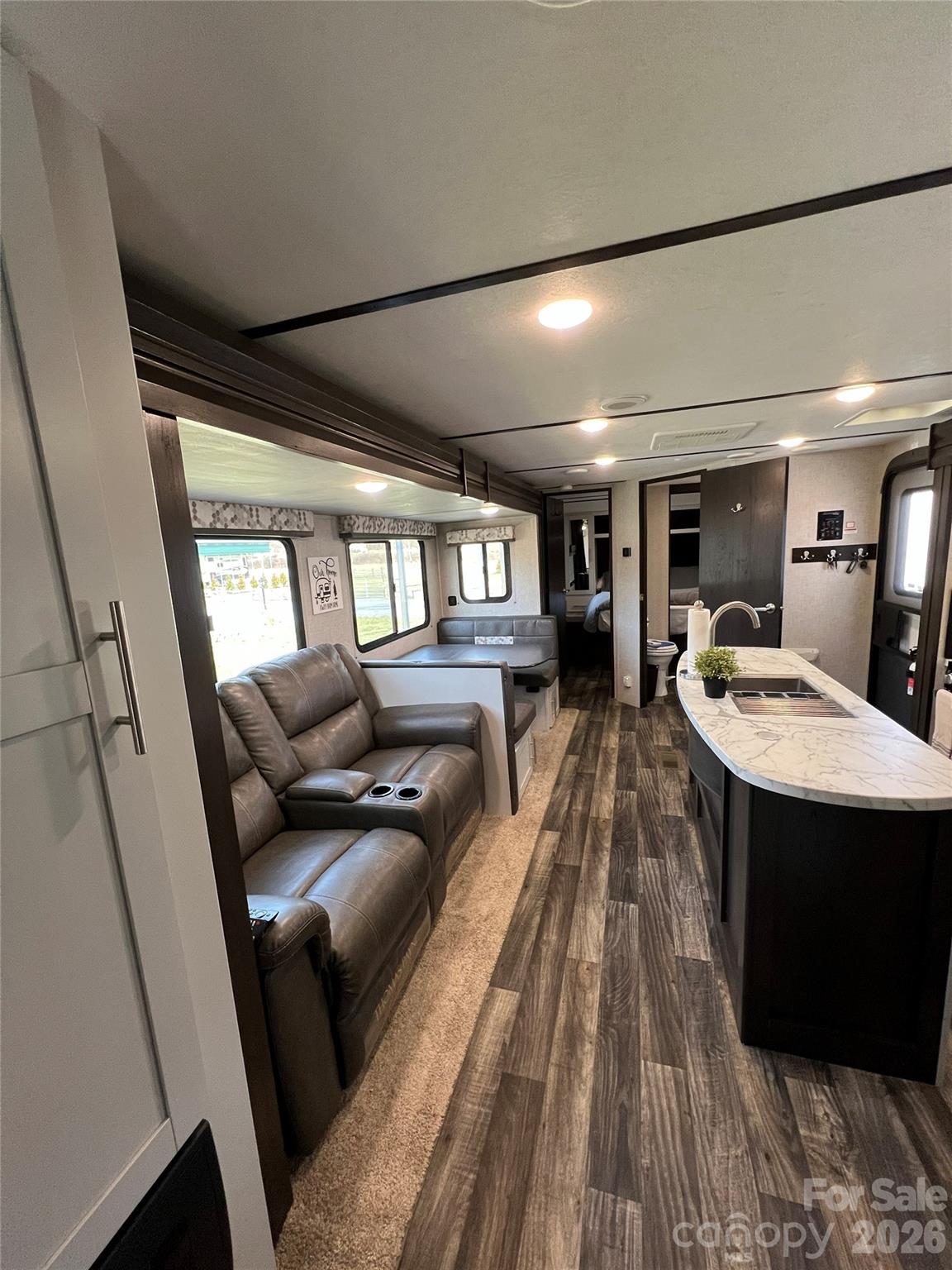 415 Hyde Road, Unit 24 Robbinsville, NC 28771 - Photo 24 of 47 a living room with furniture and a table