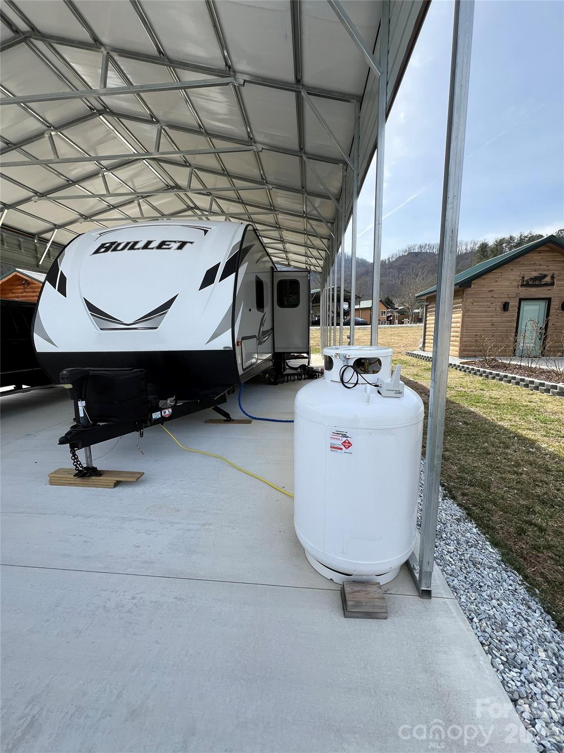 415 Hyde Road, Unit 24 Robbinsville, NC 28771 - Photo 41 of 47 a view of a room with gym equipment