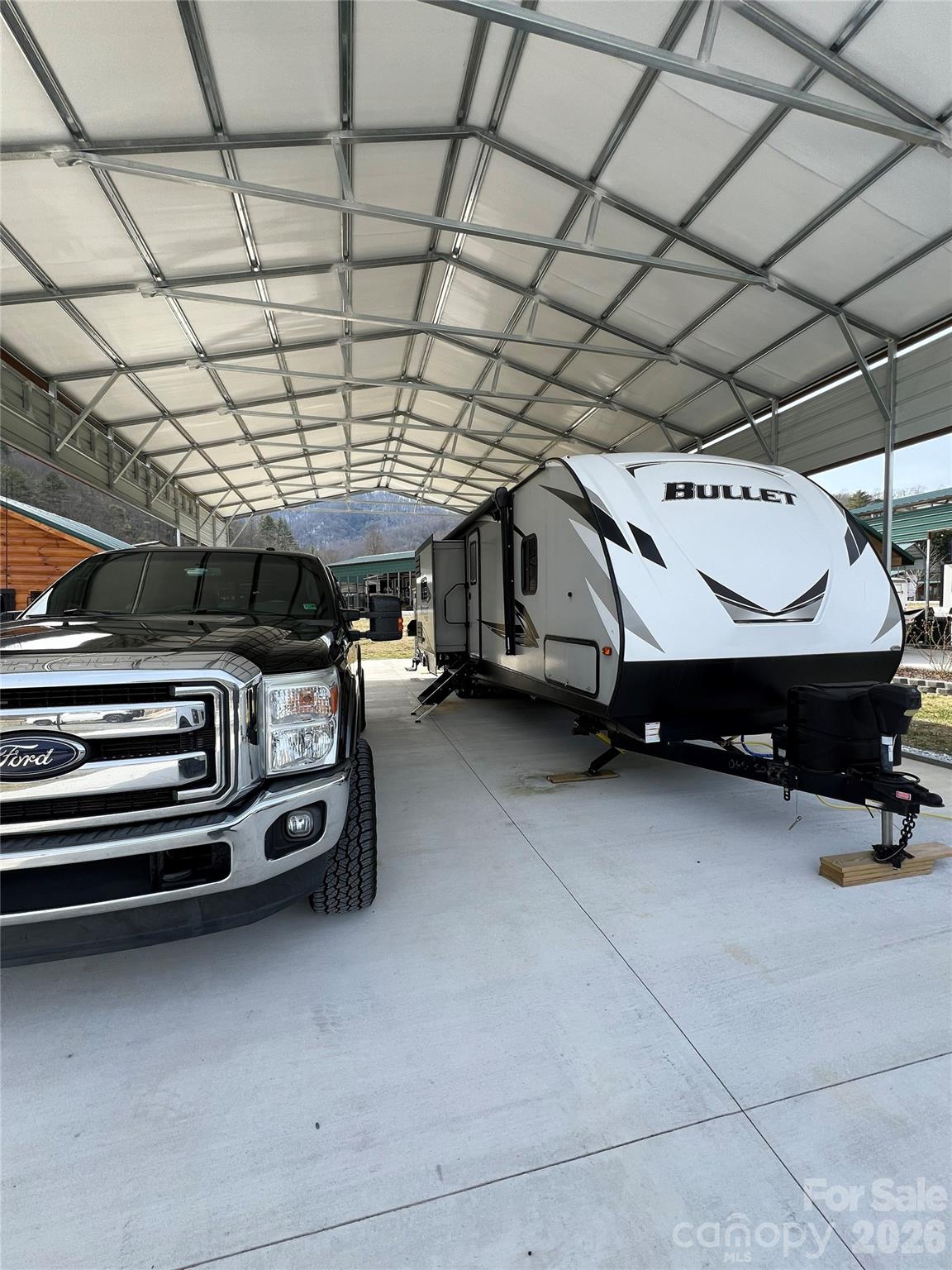 415 Hyde Road, Unit 24 Robbinsville, NC 28771 - Photo 42 of 47 a view of car garage