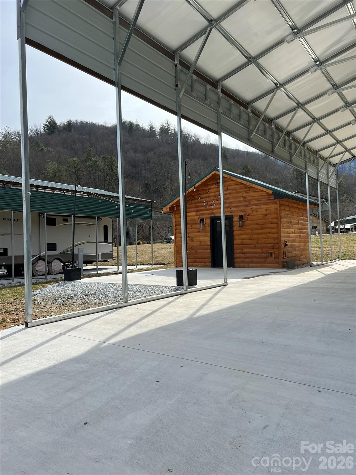 415 Hyde Road, Unit 24 Robbinsville, NC 28771 - Photo 45 of 47 a view of a parking area