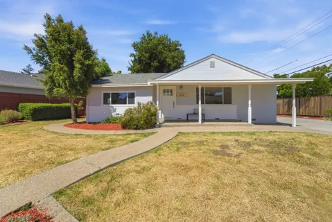 front view of a house with yard