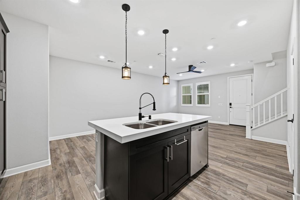 1118 Delpy View Vista, CA 92084 - Photo 12 of 32 a kitchen with a sink and window