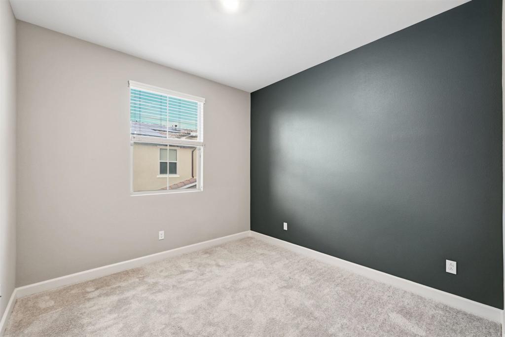 1118 Delpy View Vista, CA 92084 - Photo 22 of 32 a view of an empty room with a window