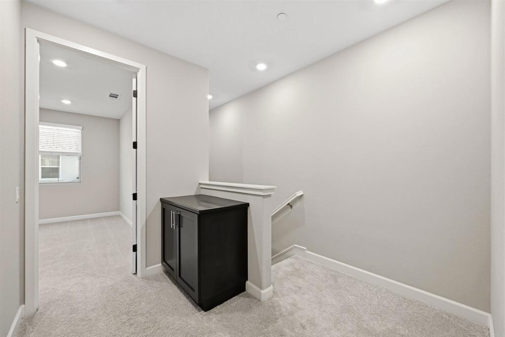 1118 Delpy View Vista, CA 92084 - Photo 23 of 32 an empty room with a fireplace