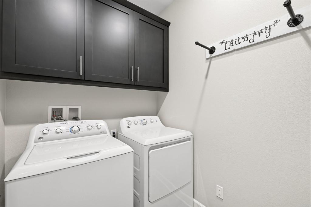 1118 Delpy View Vista, CA 92084 - Photo 24 of 32 a utility room with dryer and washer