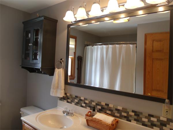 287 Wales Road Monson, MA 01057 - Photo 17 of 30 a bathroom with a sink and a mirror
