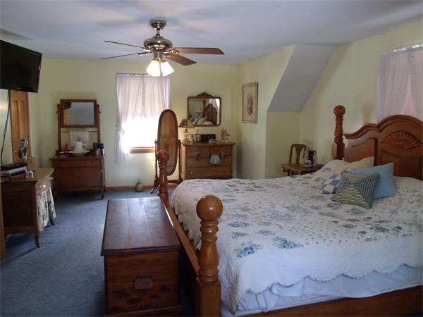 287 Wales Road Monson, MA 01057 - Photo 20 of 30 a bedroom with furniture and a window