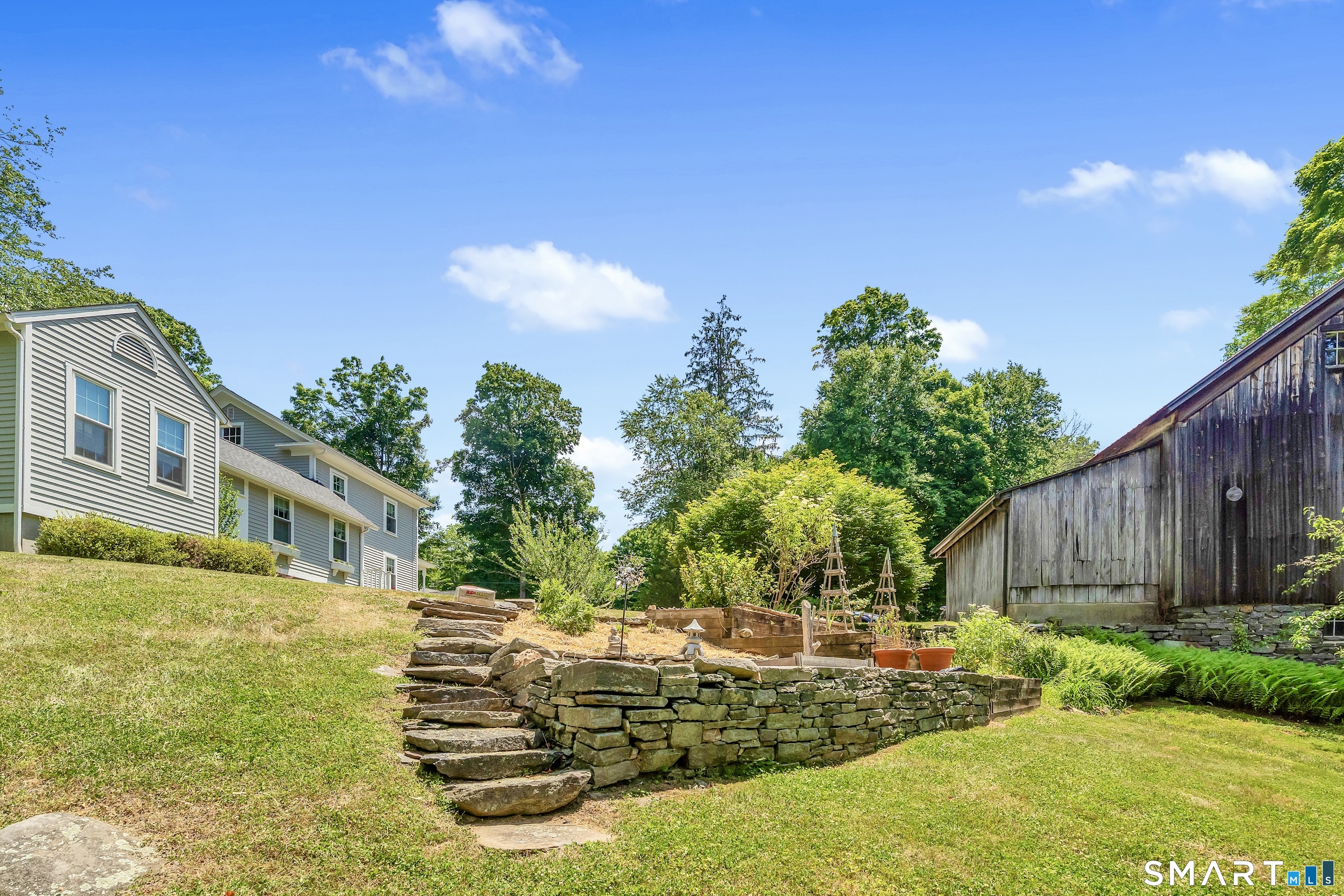 2 Timms Hill Road Haddam, CT 06438 - Photo 5 of 38 Hand-Laid Stone Steps And A Charming Stone Wall Frame The Garden